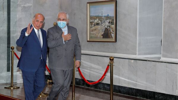 وزيرخرجية إيران في زيارة إلى بغداد مع وزير خارجية العراق فؤاد حسين - سبوتنيك عربي