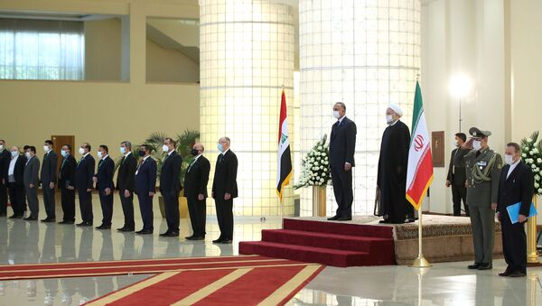 استقبال الرئيس الإيراني حسن روحاني لرئيس الوزراء العراقي مصطفى الكاظمي - سبوتنيك عربي