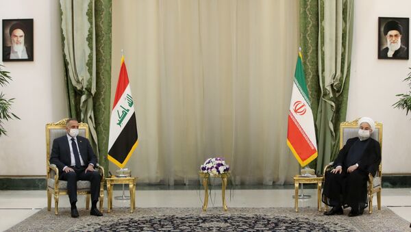 الرئيس الإيراني حسن روحاني ورئيس الوزراء العراقي مصطفى الكاظمي - سبوتنيك عربي