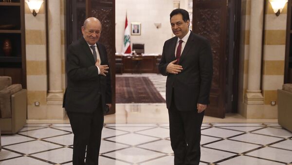 رئيس الحكومة اللبنانية حسان دياب مع وزير الخارجية الفرنسي جان ايف لودريان - سبوتنيك عربي