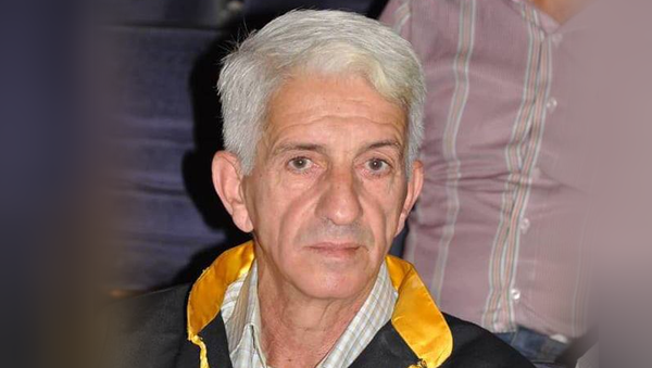 الدكتور أنور العمر مدرس في جامعة الحواش السورية  - سبوتنيك عربي