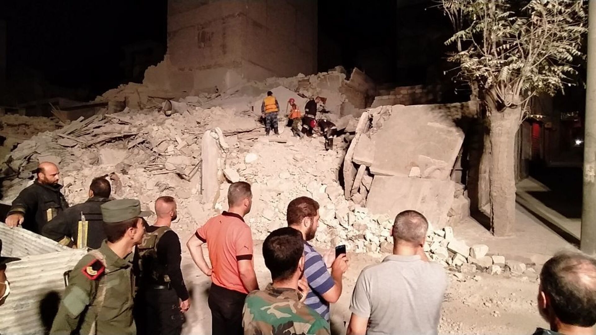 صورة أرشيفية... انهيار بناء في حلب شمالي سوريا - سبوتنيك عربي, 1920, 06.02.2023