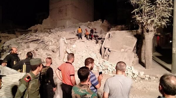 انهيار بناء في حلب شمالي سوريا - سبوتنيك عربي