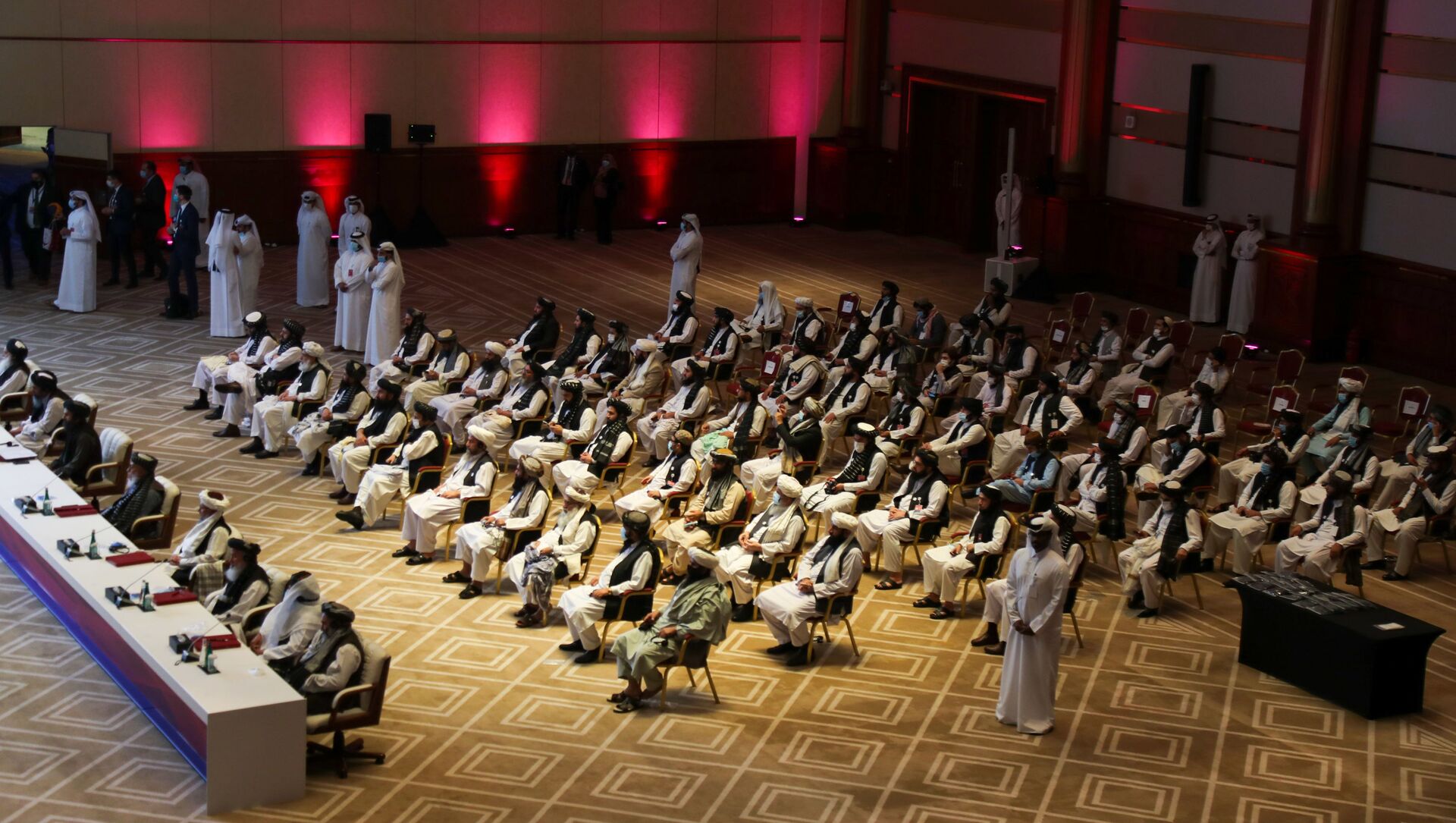 الجلسة الافتتاحية لمفاوضات السلام بين الحكومة الأفغانية وحركة طالبان، المنعقدة في الدوحة، قطر 12سبتمبر 2020 - سبوتنيك عربي, 1920, 17.04.2021