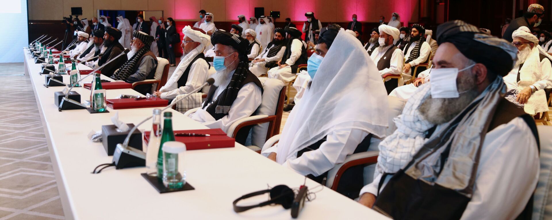 الجلسة الافتتاحية لمفاوضات السلام بين الحكومة الأفغانية وحركة طالبان، المنعقدة في الدوحة، قطر 12سبتمبر 2020 - سبوتنيك عربي, 1920, 09.05.2021