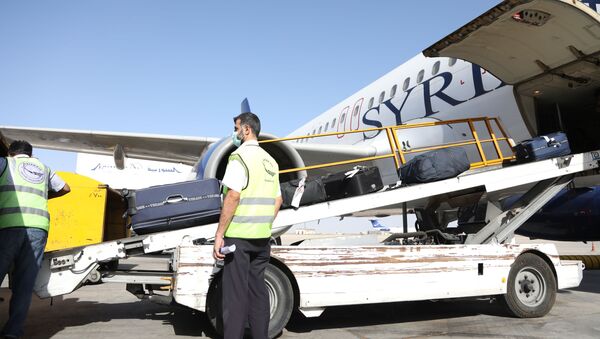 مطار دمشق الدولي يعود للعمل بعد نحو غياب سبعة أشهر بسب اجراءات كورونا الوقائية، سوريا 1 أكتوبر 2020 - سبوتنيك عربي