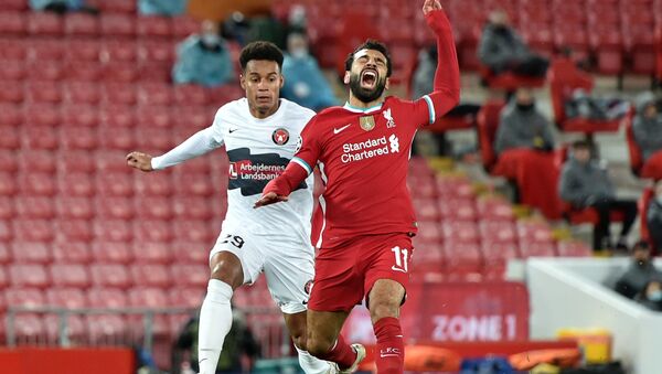 إصابة محمد صلاح في مباراة فريقه ليفربول أمام ضيفه ميتيلاند بدوري أبطال أوروبا - سبوتنيك عربي