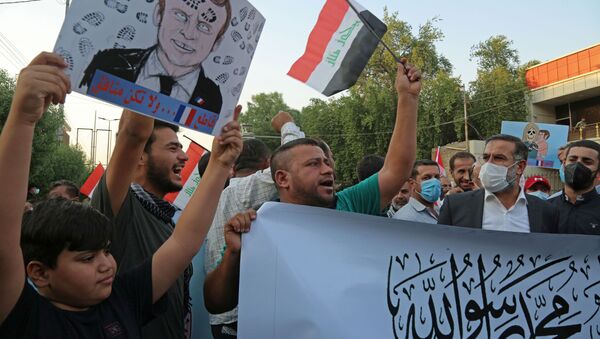 حملة جماهرية احتجاجية ضد تصريحات الرئيس الفرنسي إيمانويل ماكرون حول رسومات الكاريكاتير المسيئة للرسول محمد (ص) في بغداد، العراق 26 أكتوبر 2020 - سبوتنيك عربي
