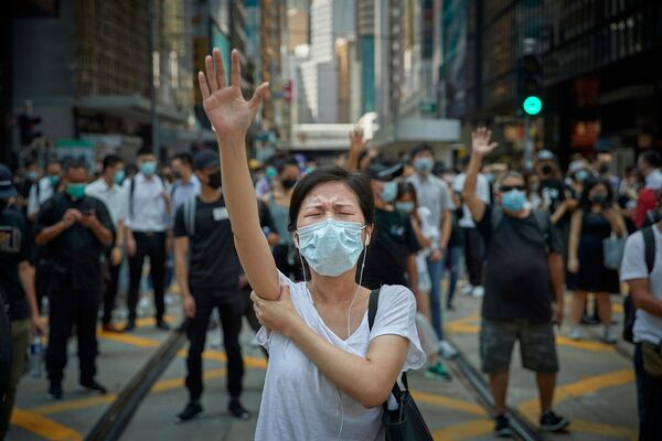 صورة بعنوان المظاهرات المؤيدة للديمقراطية، هونغ كونغ: ثورة عصرنا، للمصور الفرنسي كيران ريدلي، التي فازت في فئة التحرير/ مصور صحفي لهذا العام للمصورين المحترفين في مسابقة جوائز التصوير الدولية 2020 - سبوتنيك عربي