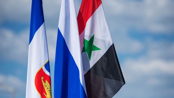 العلم الروسي والسوري - سبوتنيك عربي