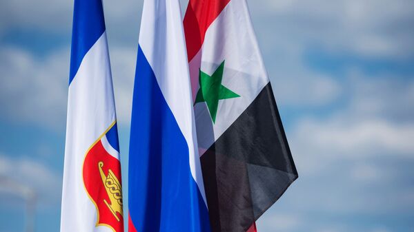 العلم الروسي والسوري - سبوتنيك عربي