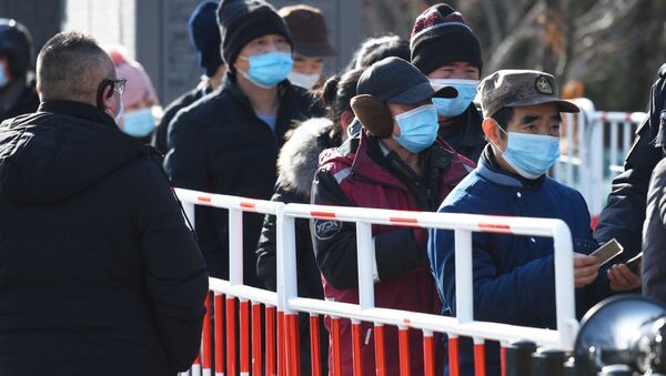 حملة الكشف عن فيروس كورونا واسعة النطاق في بكين، بسبب موجة جديدة لحالات الإصابة كوفيد-19 في الصين 11 يناير 2021 - سبوتنيك عربي