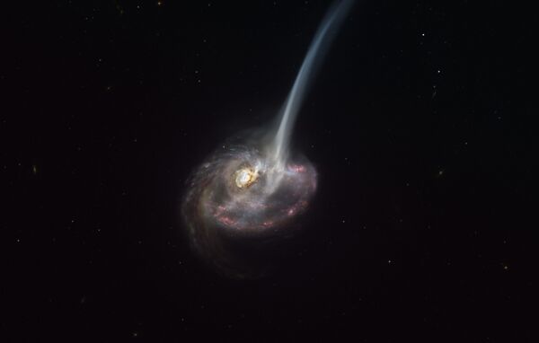 تُظهر الصورة التي نشرها المرصد الأوروبي الجنوبي في 8 يناير 2021 انطباعًا فنيًا عن المجرة ID2299، نتاج تصادم المجرة، وبعض الغازات المنبعثة من ذيل المد والجزر نتيجة الاندماج. - سبوتنيك عربي