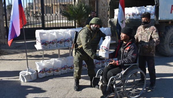 مساعدات روسية لأهالي ديرالزور شرقي سوريا - سبوتنيك عربي