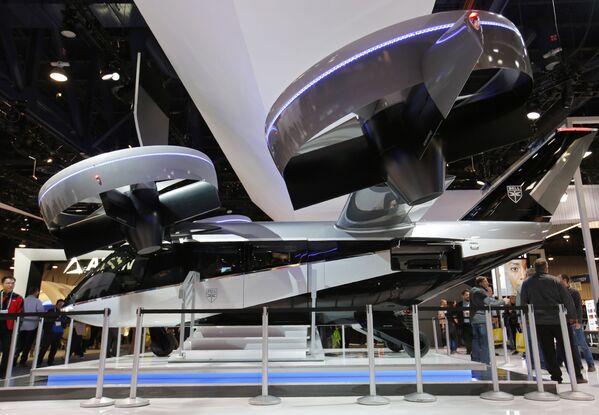 عرض four-duct electric، وهو تاكسي جوي يعمل على الطاقة الكهربائية بأربعة مجاري هوائية (أو هجين كهربائي)، في كشك بيل في معرض التقني، في لاس فيغاس، الواليات المتحدة 8 يناير 2020 - سبوتنيك عربي