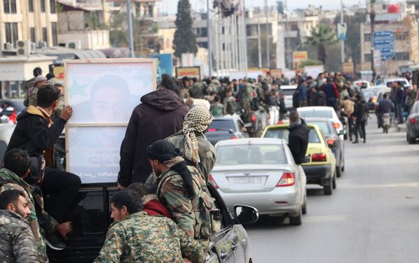 تشييع 12 جنديا قضوا خلال اشتباكات مع داعش، حلب، سوريا 4 فبراير 2021 - سبوتنيك عربي