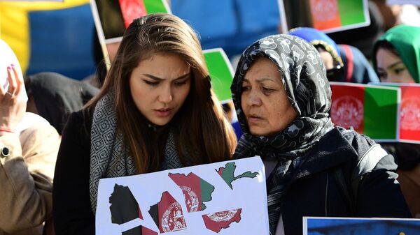  نساء أفغانيات يشاركن في احتجاج يطالب الحكومة الأفغانية بوقف التمييز ضدهن - سبوتنيك عربي