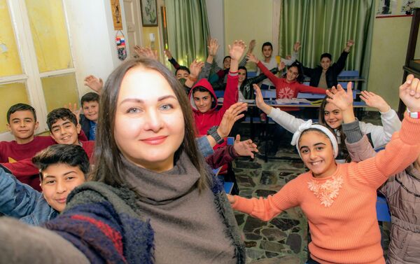 معلمة اللغة الروسية في سوريا  - سبوتنيك عربي