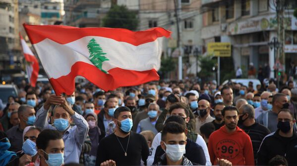 مظاهرات كبيرة من أجل إنقاذ لبنان وخلاص اللبنانيين في صيدا، لبنان مارس 2021 - سبوتنيك عربي