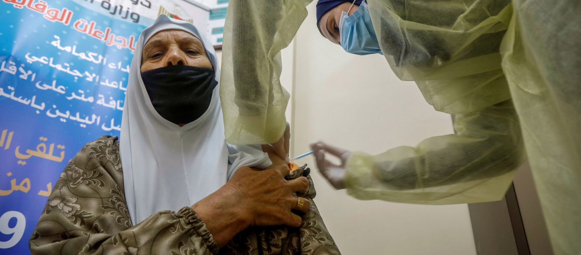 التطعيم باللقاح أسترازينيكا ضد فيروس كورونا في طوباس، الضفة الغربية، فلسطين، 25 مارس 2021 - سبوتنيك عربي, 1920, 07.05.2021