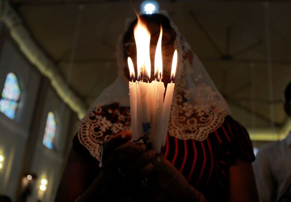 مراسم الاحتفال بعيد الفصح الكاثوليكي في كاتوابتيا، سريلانكا 4 أبريل 2021 - سبوتنيك عربي