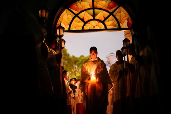 مراسم الاحتفال بعيد الفصح الكاثوليكي في شنغهاي، الصين 4 أبريل 2021 - سبوتنيك عربي