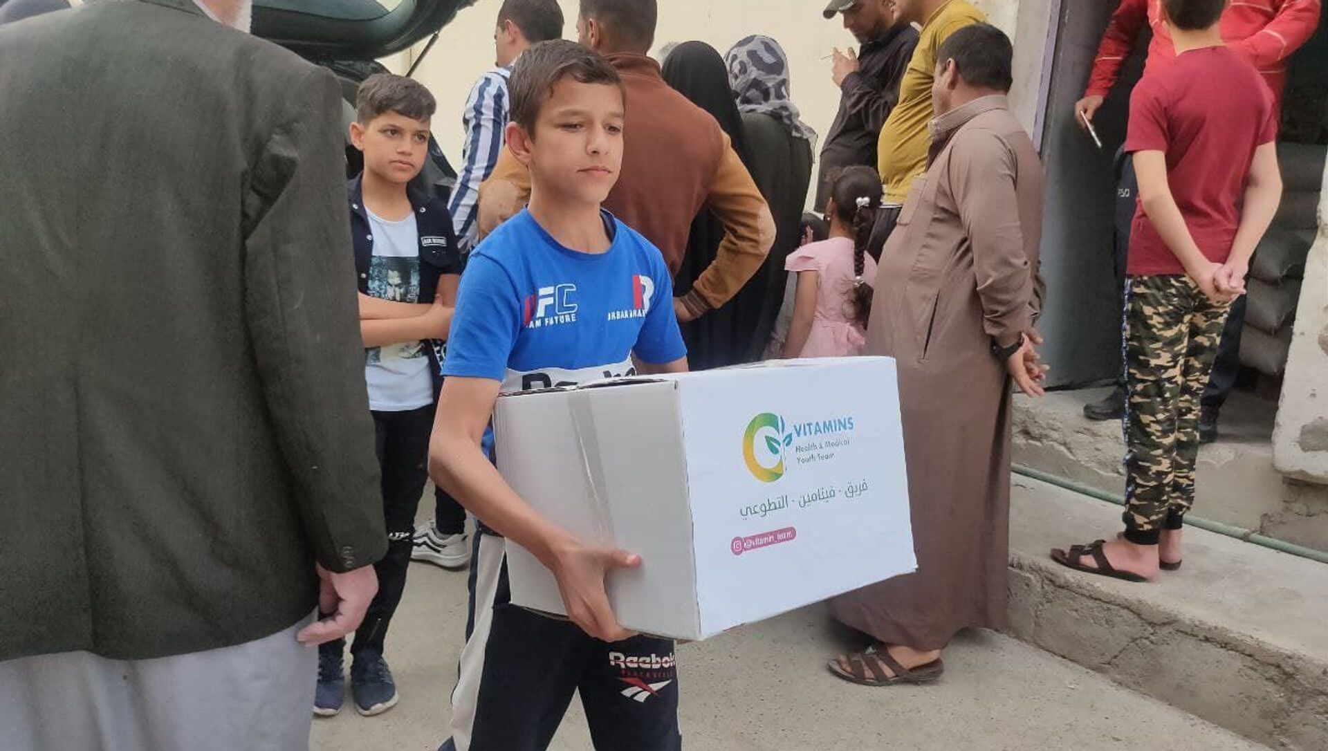 توزيع المساعدات للمحتاجين في رمضان في الموصل، العراق 15 أبريل 2021 - سبوتنيك عربي, 1920, 26.10.2021
