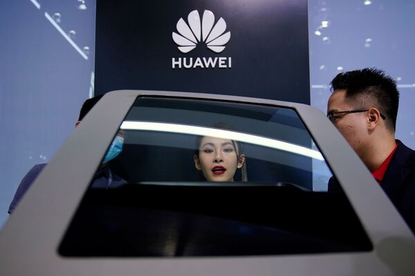 جناح (Huawei) في معرض شنغهاي للسيارات، الصين 19 أبريل 2021 - سبوتنيك عربي