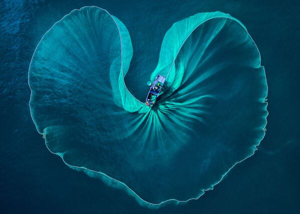 صورة قلب البحر، للمصور الفيتنامي فيوس هواي نغيوين، حصلت على تقدير عالي في مسابقة توزيع جوائز كل شيء عن الصورة لعام 2021 - سبوتنيك عربي