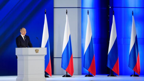 الرئيس الروسي فلاديمير بوتين خلال رسالته السنوية للبرلمان الروسي في موسكو، روسيا 21 أبريل 2021 - سبوتنيك عربي