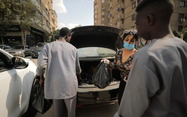 مبادرة حسناوت الخير النسائية لمساعدة آلاف الأسر الليبية بمصر  - سبوتنيك عربي