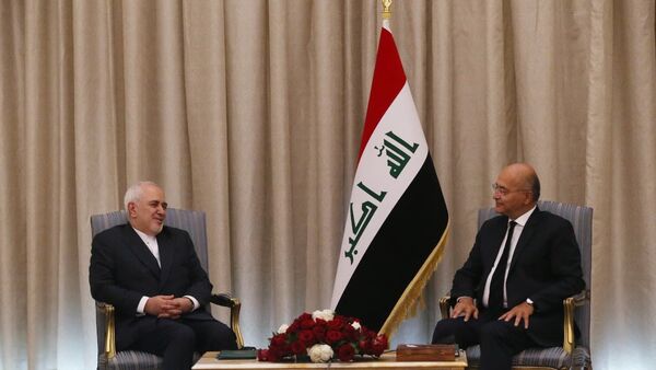 الرئيس العراقي برهم صالح يستقبل وزير الخارجية الإيراني محمد جواد ظريف - سبوتنيك عربي