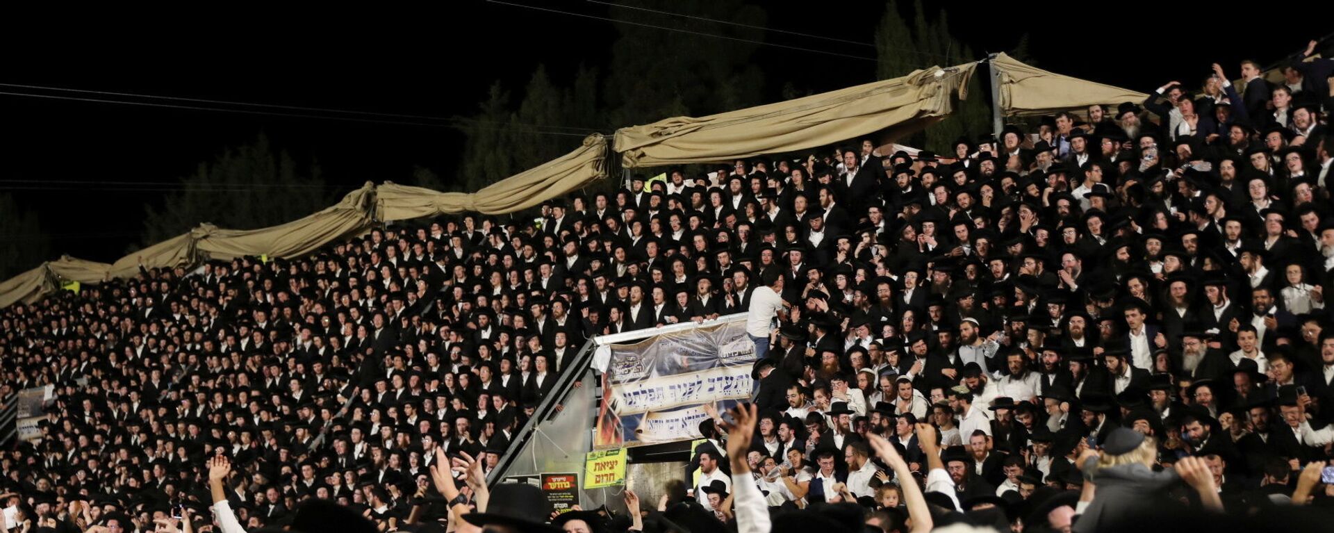المصلون اليهود يغنون ويرقصون في حفل لاغ بعمر في جبل ميرون، شمالي إسرائيل  - سبوتنيك عربي, 1920, 16.05.2021