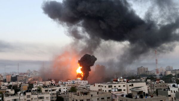  قصف مدينة غزة صباح يوم الأربعاء، قطاع غزة، فلسطين 12 مايو 2021 - سبوتنيك عربي