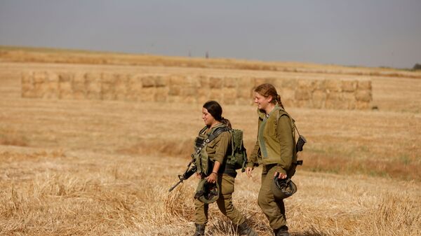 قوات الجيش الإسرائيلي ينتشر على الحدود مع قطاع غزة، فلسطين، إسرائيل 12 مايو 2021 - سبوتنيك عربي
