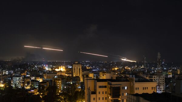 إطلاق المقاومة الفلسطينية الصواريخ من قطاع غزة باتجاه أراضي غلاف غزة، فلسطين  12 مايو2021 - سبوتنيك عربي