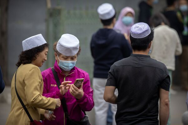  صلاة عيد الفطر في مسجد نيوجي في بكين، الصين13 مايو 2021 - سبوتنيك عربي