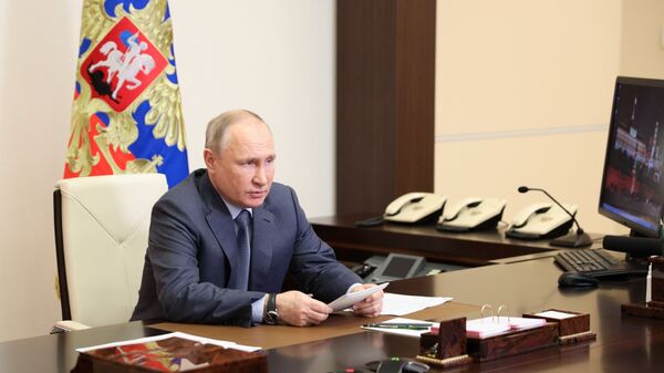  الرئيس الروسي فلاديمير بوتين خلال اجتماع افتراضي مع ممثلي الحكومة الروسية، في مقره نوفور أوغاروفو، ضواحي موسكو، روسيا 13 مايو 2021 - سبوتنيك عربي