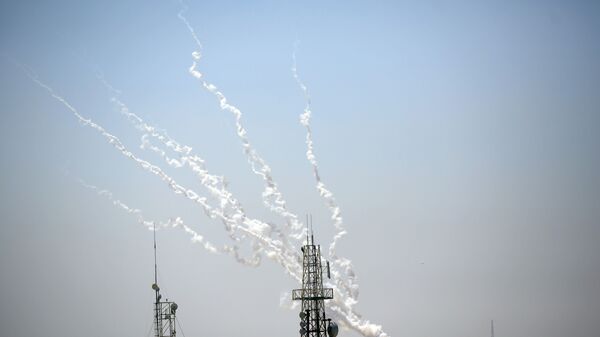 إطلاق رشقات جديدة من صواريخ المقاومة الفلسطينية من قطاع غزة، فلسطين 13 مايو 2021 - سبوتنيك عربي
