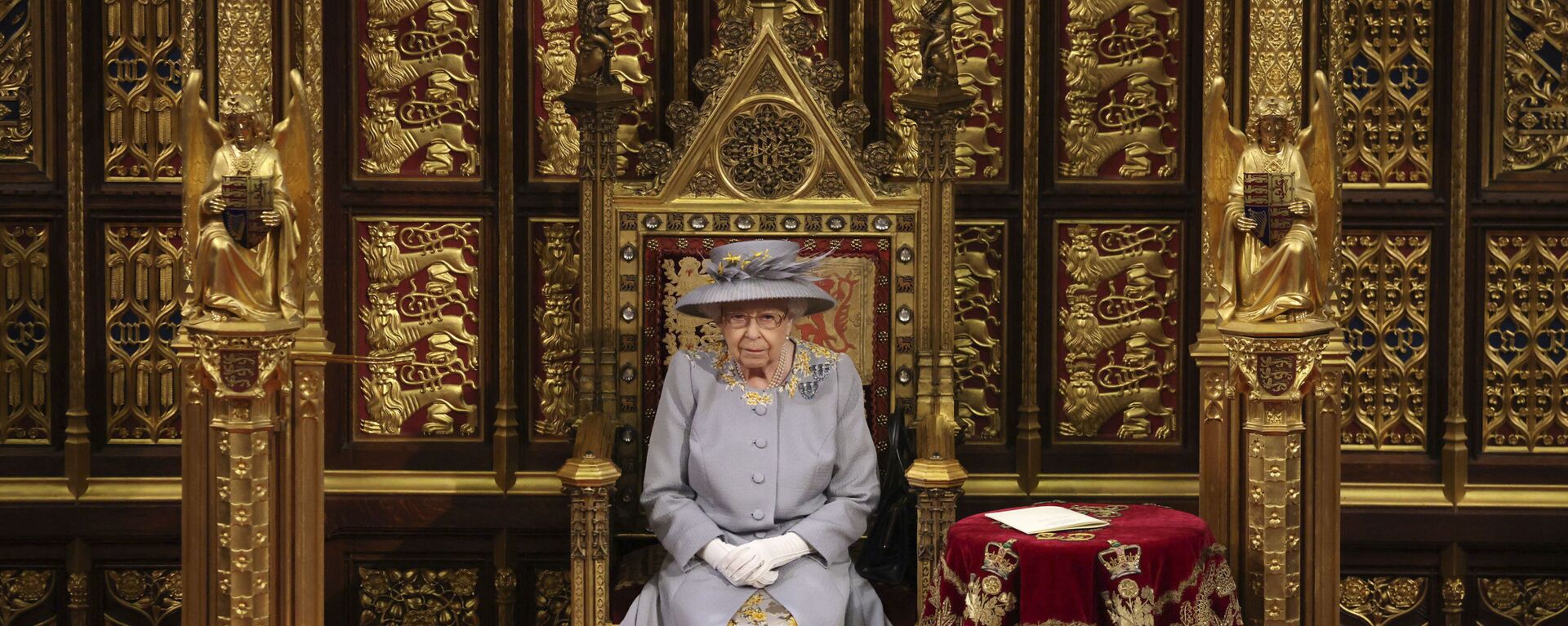 ملكة بريطانيا العظمى، إليزابيث الثانية، تلقي كلمة في مجلس اللوردات بقصر وستمنستر في لندن، بريطانيا 11 مايو 2021 - سبوتنيك عربي, 1920, 08.09.2022