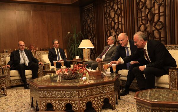 رئيس أبخازيا أصلان بزانيا في زيارته إلى دمشق  - سبوتنيك عربي