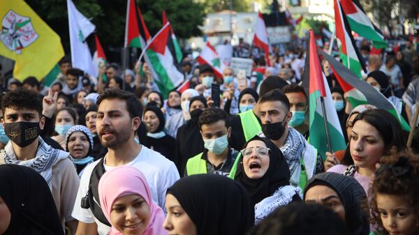  مسيرة شعبية حاشدة في بيروت دعماً للشعب الفلسطيني وتنديدا بالعدوان الإسرائيلي على غزة، لبنان 18 مايو 2021 - سبوتنيك عربي