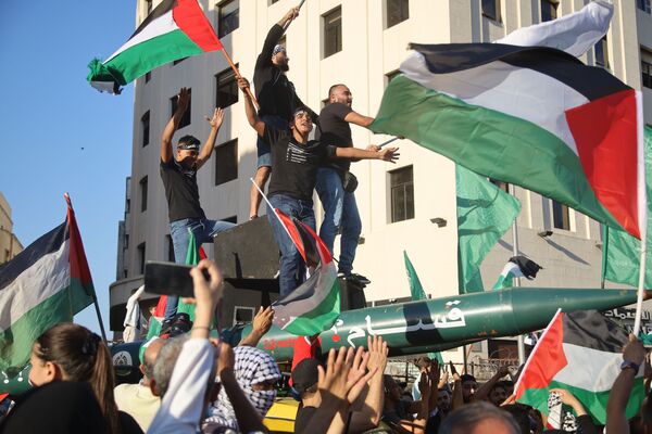 مسيرة شعبية حاشدة في بيروت دعماً للشعب الفلسطيني وتنديدا بالعدوان الإسرائيلي على غزة، لبنان 18 مايو 2021 - سبوتنيك عربي