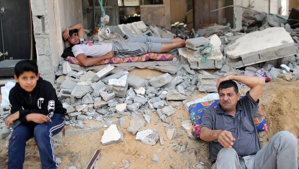 عودة الفلسطينيين إلى منازلهم بعد اتفاق وقف إطلاق النار، قطاع غزة 21 مايو 2021 - سبوتنيك عربي