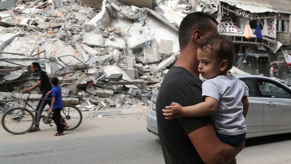 عودة الفلسطينيين إلى منازلهم بعد اتفاق وقف إطلاق النار، قطاع غزة 21 مايو 2021 - سبوتنيك عربي