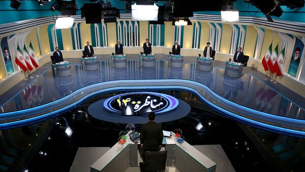منظر عام للمناظرة الانتخابية في استوديو تلفزيوني، في طهران، إيران ، 8 يونيو/ حزيران 2021 - سبوتنيك عربي