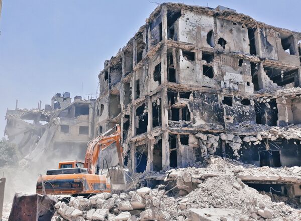 إزالة الأبنية الآيلة للسقوط في حمص القديمة لتسريع عودة المهجرين، سوريا 17 يونيو 2021 - سبوتنيك عربي