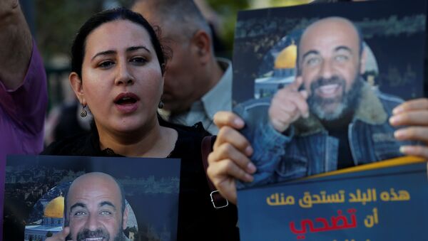 احتجاجات عارمة في الضفة الغربية ضد مقتل الناشط السياسي نزار بنات، الخليل، 27 يونيو 2021 - سبوتنيك عربي