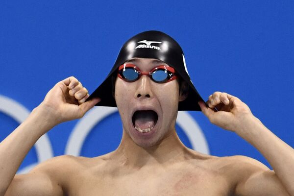 الياباني كوسوكي هاجينو يستعد للمنافسة في نصف نهائي 200 متر حرة للرجال، في دورة الألعاب الأولمبية ريو 2016، في الملعب الأولمبي للألعاب المائية في ريو دي جانيرو، البرازيل 7 أغسطس 2016 - سبوتنيك عربي