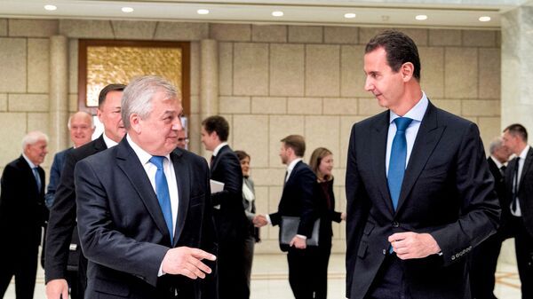 الرئيس السوري بشار الأسد يستقبل المبعوث الخاص للرئيس الروسي، ألكسندر لافرينتيف في دمشق، سوريا 1 يوليو 2021 - سبوتنيك عربي